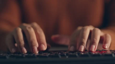 Timelapse womans hand typing on keyboard at night, overtime Stock Footage 196912060