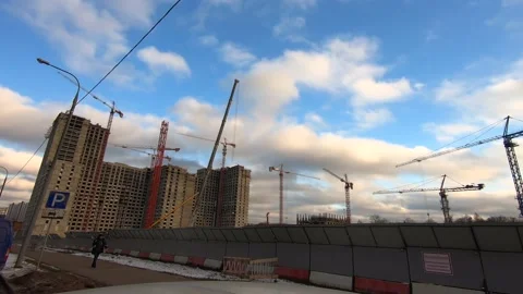 Timelapse work tower cranes when building a large office building Video stock 145528022