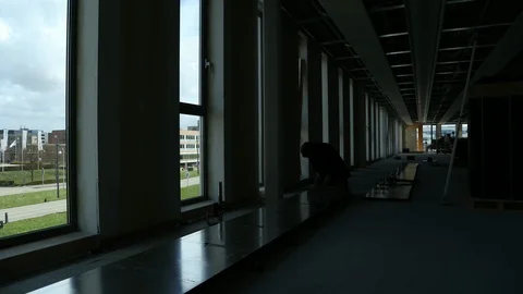 Timelapse of a worker placing the Floor Stock Footage 95761129