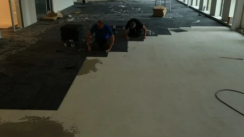 Timelapse Workers Placing Carpet Squares Stock Footage 95777578