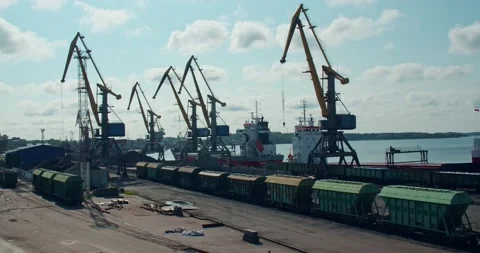 Timelapse of the workflow in the port against the background of moving clouds Stock Footage 159799471