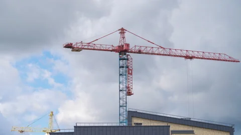 Timelapse with working construction cranes building houses on sky background. Stock-Footage 138148494