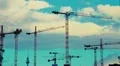 Timelapse of working cranes and cloudy sky HD Footage