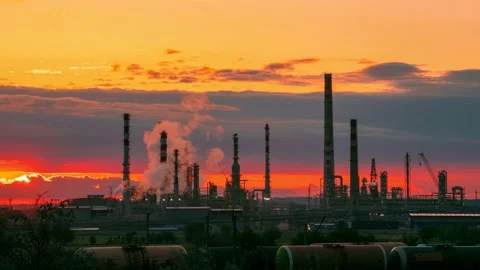Timelapse of a working factory on a sunset background Stock Footage 143741780