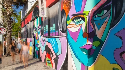 Timelapse in Wynwood Art district of graffiti painted colorful woman face, Miami Stock Footage