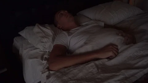 Timelapse of a Young Man Can't Sleep, Insomnia and Anxiety, Close Up Stock Footage 96259356