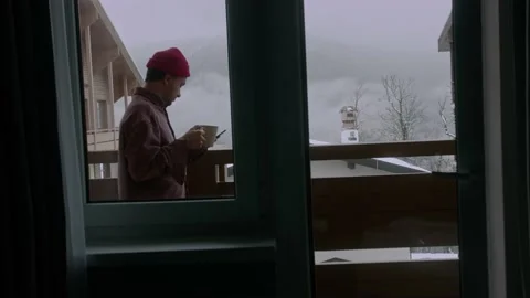 Timelapse of young man spending time with smart phone and cup of coffee Stock Footage 148205438