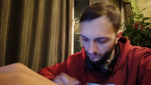 Timelapse of a young man working with a computer at home. Male freelancer at wor Stock-Footage 121381972