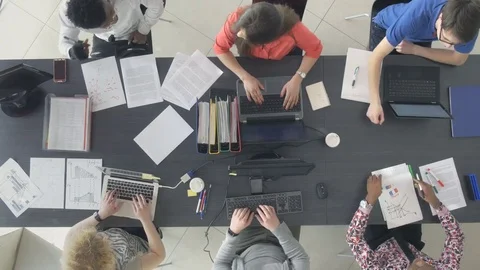 Timelapse of young office workers managing the new online business Stock Footage 73907402