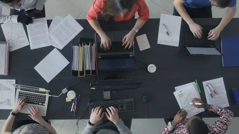 Timelapse of young professionals communicating and analyzing the data Stock-Footage 73907364