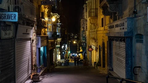 Timelapse zoom in view of a typical small lane at night in Valletta (Malta) Stock Footage 107516653
