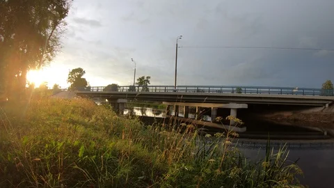 Timelapse.Automobile bridge in the evening at sunset. Stock Footage 93500691