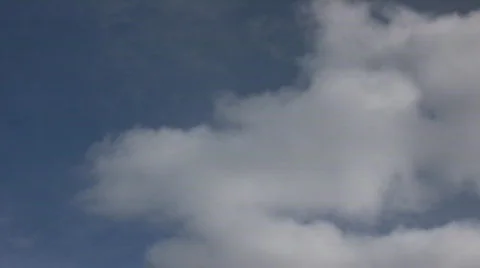 Timelapsed clouds drift and change shapes (Hight Definition) Stock Footage 65809
