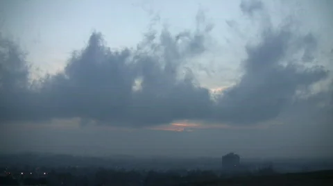 Timelapsed clouds slowly drift along at dusk (High Definition) Stock Footage 69045