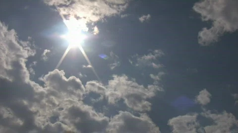 Timelapsed clouds slowly drift amidst the sun (High Definition) Video stock 67840