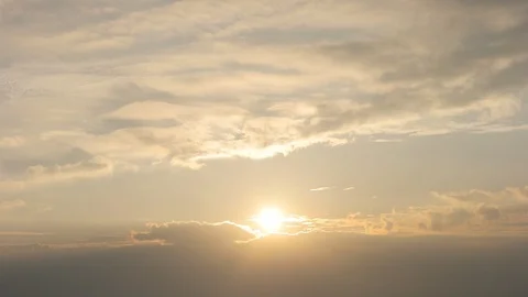 Timelapsed of sunrise through the clouds. Stock Footage 86971554