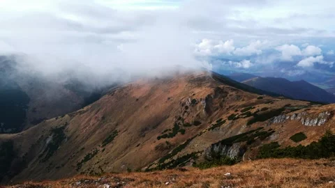 Timelapse,misty . Clouds Moving Over Mountain Ridge Stock Footage 313594298