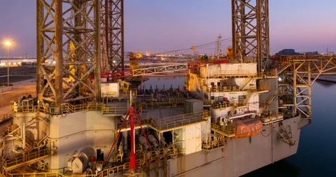 Timelase of a jack up rig in the shipyard (night to day timelapse) Stock Footage 116505024