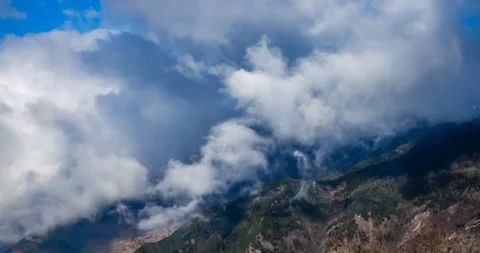 Timelaspe shot of Cloud waterfall in Western Sichuan/Sichuan,China Stock Footage 105796354