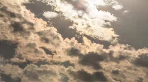 TIMELASPE_CLOUD_RAINBOW_INTO_SUN Stock Footage 32351493