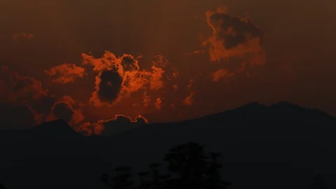 Timelaspse of Sunset with clouds over mountain. 4K, Ultra HD video clip Stock Footage 87275911