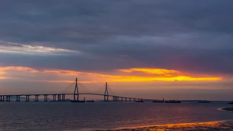 TimeLepse 4k  Sunset scenery in front of Incheon Bridge Stock Footage 242311085