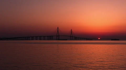 TimeLepse 4k  Sunset scenery in front of Incheon Bridge Stock Footage 242311496