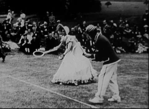 Timeless Elegance: Playing Tennis in Old-Fashioned Clothes - 1940s Stock-Footage 169205651