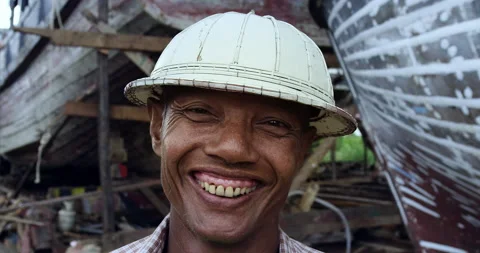 Timeless portrait of a real unique authentic Asian Myanmar wood boat carpenter. Видео 201093915