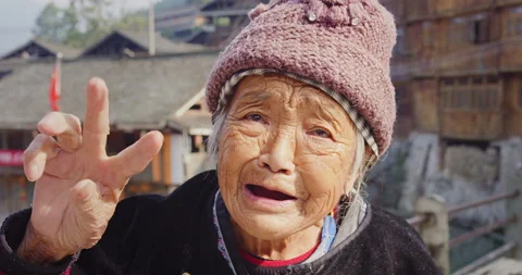 Timeless portrait of a real unique authentic Asian Chinese village woman, doing Stock Footage 201093932