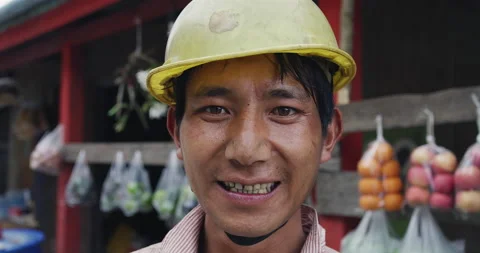 Timeless portrait of a real unique authentic Asian Myanmar construction worker i Stock Footage 201093946