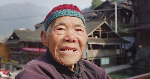 Timeless portrait of a real unique authentic Asian Chinese village man crying wi Stock Footage 201094086