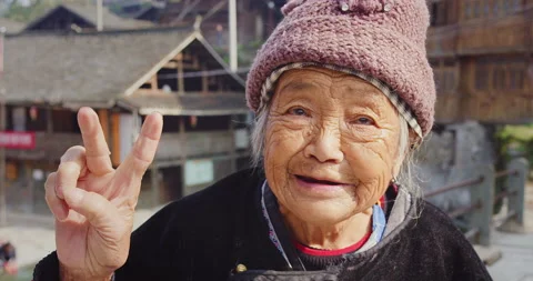 Timeless portrait of a real unique authentic Asian Chinese village woman, doing Vídeos de archivo 201094109