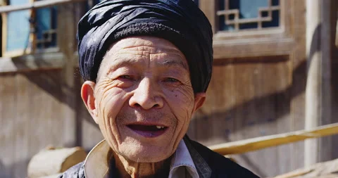 Timeless portrait of a real unique authentic Asian Chinese village man, rice far Stock Footage 201094342