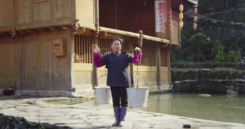 Timeless portrait of a real unique authentic Asian Chinese village woman farmer Video stock 201094837