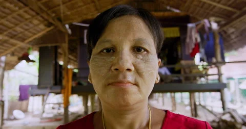 Timeless portrait of a real unique authentic Asian woman in Myanmar. Hand held, Stock Footage 201096065