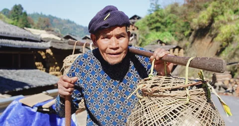 Timeless portrait of a real unique authentic Asian Chinese village duck farmer m Stock Footage 201096427