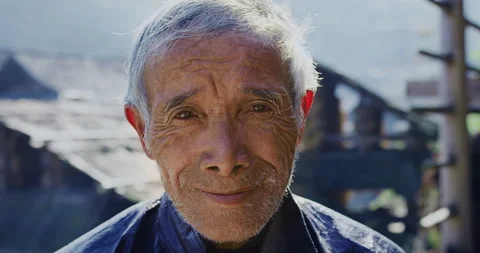 Timeless portrait of a real unique authentic Asian Chinese village man, rice far Stock Footage 201096468
