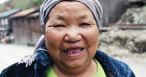 Timeless portrait of a real unique authentic Asian Myanmar woman in mountain vil Stock Footage 201097065