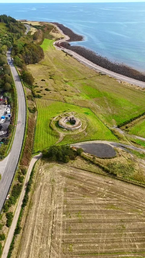 Timeless Scottish Heritage: 4K Drone Footage of Iron Age Coastal Fort Stock Footage 330674608