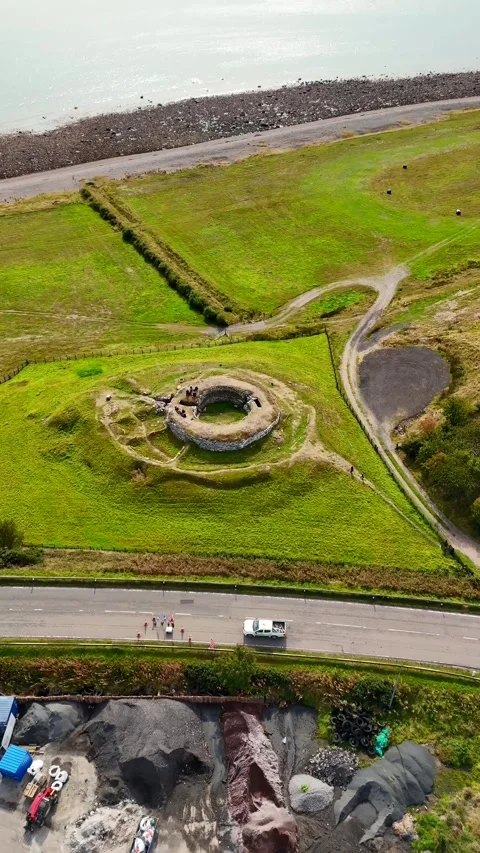 Timeless Scottish Heritage: 4K Drone Footage of Iron Age Coastal Fort Stock Footage 330674945