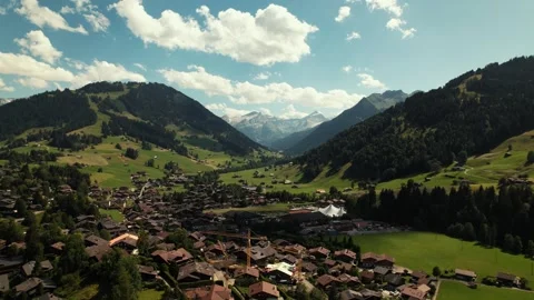 Timeless summer scene of valley and village in swiss alps. Gstaad, switzerland. Video stock 296812586