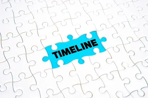 Timeline concept with missing puzzle piece on blue background Stock Photos