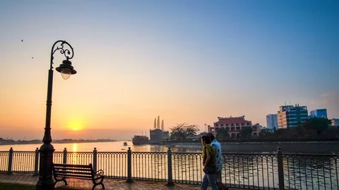 Timelpase or time lapse sunset in a park at riverside in Ho Chi Minh city Stock Footage 94786510