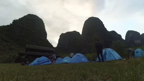 Timelpase of students setting up tents, camping in Guilin Mountains Stock Footage 74426067