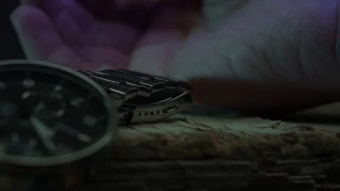 Timepiece Beside Hand in Emergency Light on Floor. Stock Footage 260880589