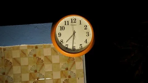 Timepiece Wall clock closeup. Hanging wall watch with modern alarm sound and  Foto stock
