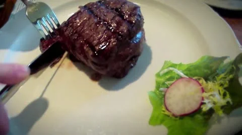 Timeplapse of a grilled steak getting eaten Stock Footage 20444258