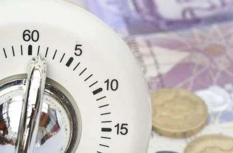 Timer with cash background timer with cash in background Copyright: xZoona... Stock Photos