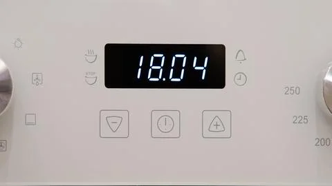 Timer clock on the kitchen oven. Cooking time, timelapse Stock Photos